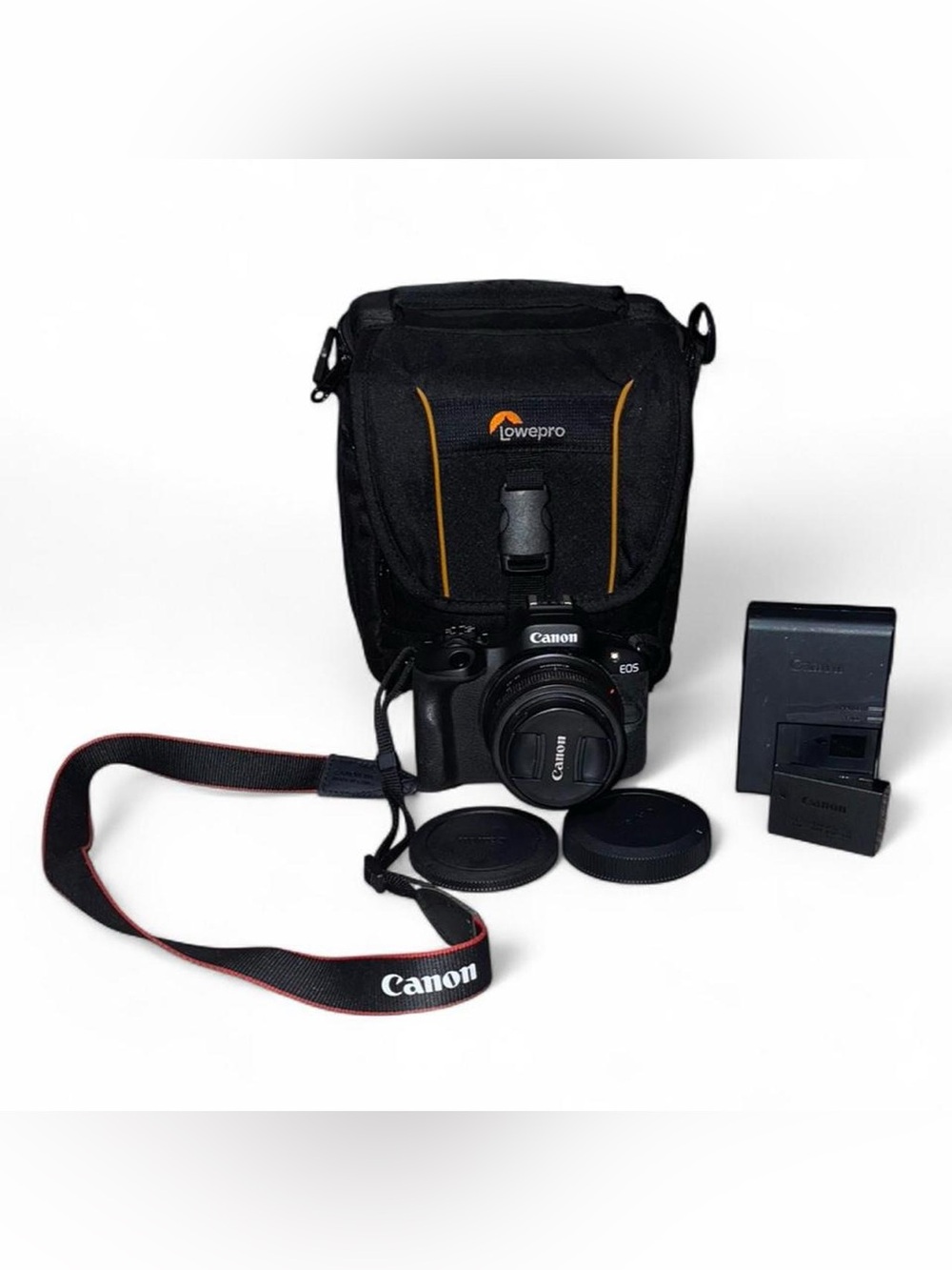Canon EOS R100 Mirrorless Camera w/ 18-45mm Lens Charger & Bag